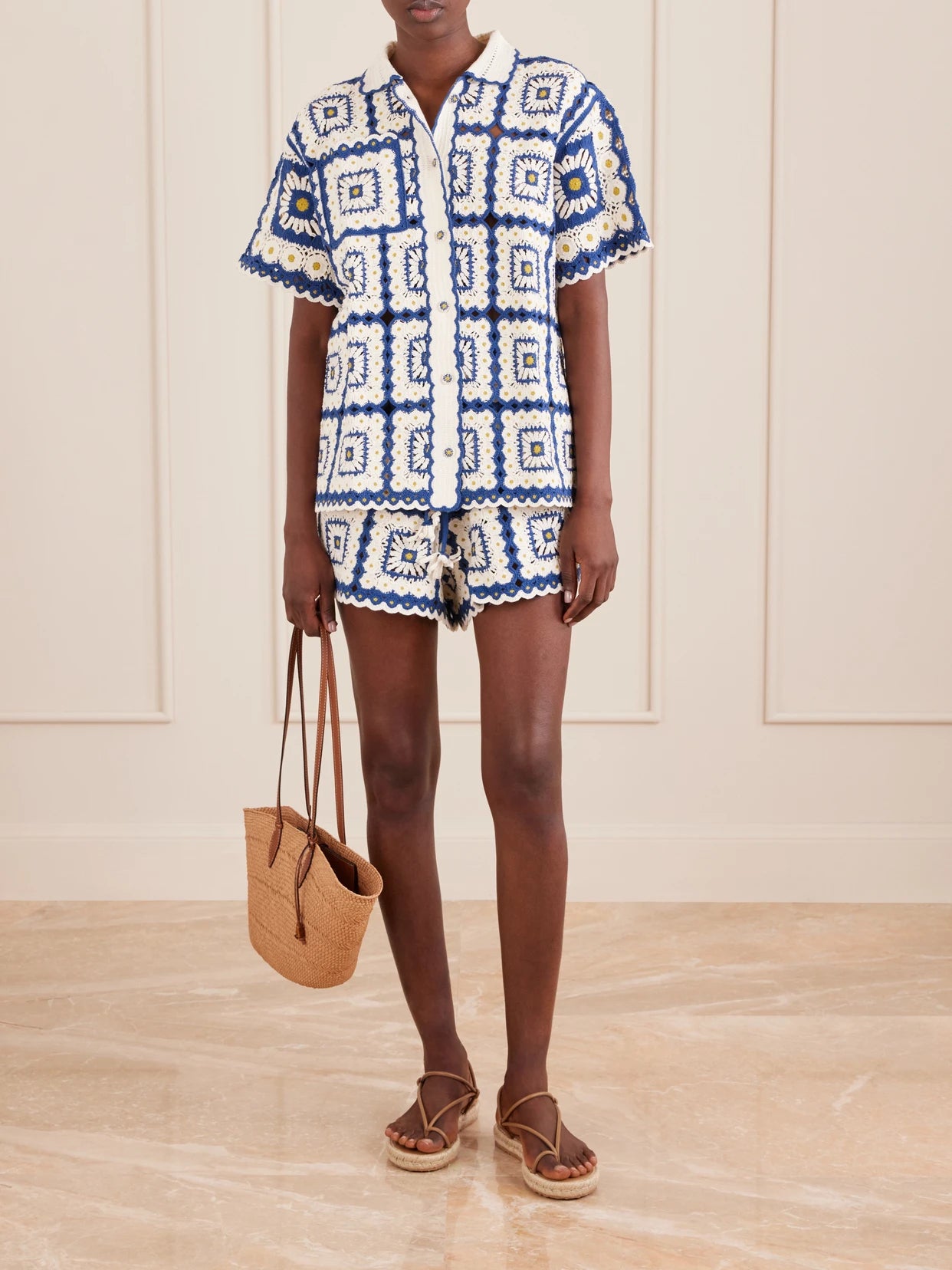 Image of a model wearing Shorts. Product name - Dolly Crocheted Cotton Shorts in Blue colour by brand - ALÉMAIS