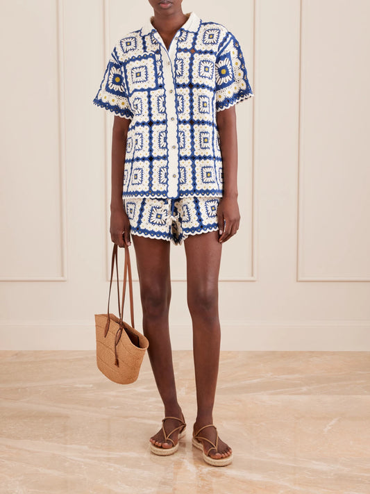 Image of a model wearing Shorts. Product name - Dolly Crocheted Cotton Shorts in Blue colour by brand - ALÉMAIS