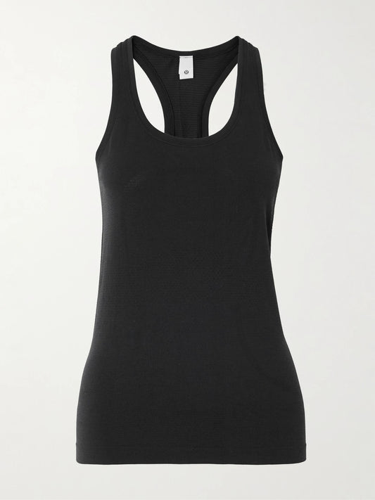 Image of a model wearing Tops. Product name - Swiftly Tech Racerback Tank Top 2.0 - Waist Length in Black colour by brand - lululemon