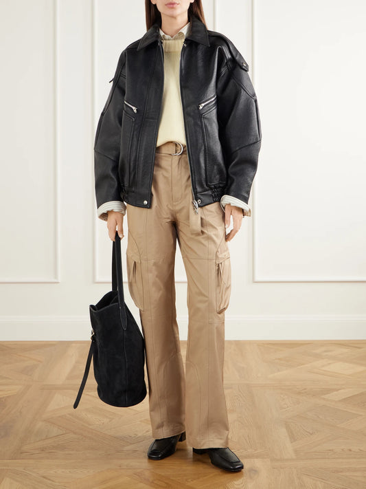 Image of a model wearing Pants. Product name - Kelly Belted Paneled Cotton-blend Twill Wide-leg Cargo Pants in Camel colour by brand - The Frankie Shop