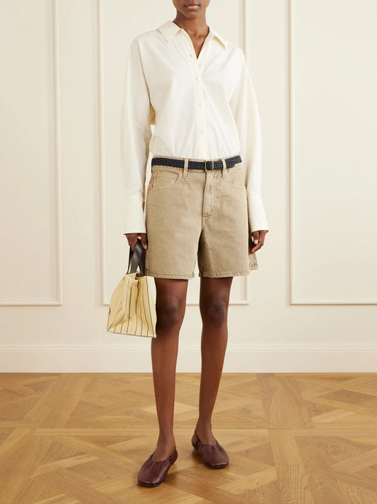 Image of a model wearing Shorts. Product name - Walker Cotton Short in Army green colour by brand - SLVRLAKE