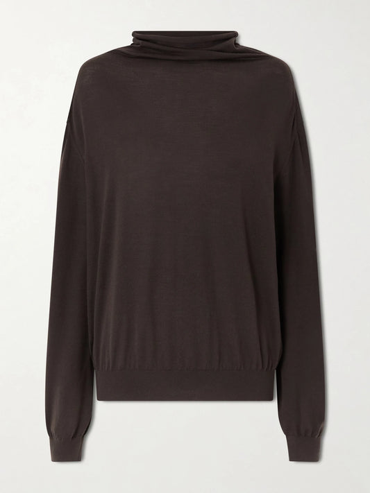 Image of a model wearing Outerwear. Product name - Annette Merino Wool Turtleneck Sweater in Dark brown colour by brand - KHAITE