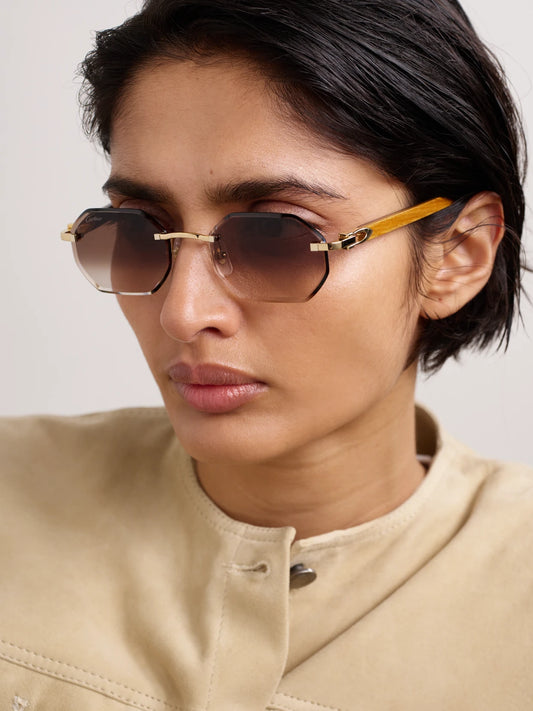 Image of Sunglasses. Product name - Octagon-frame Gold-tone And Wood Sunglasses in Multi colour by brand - Cartier Eyewear