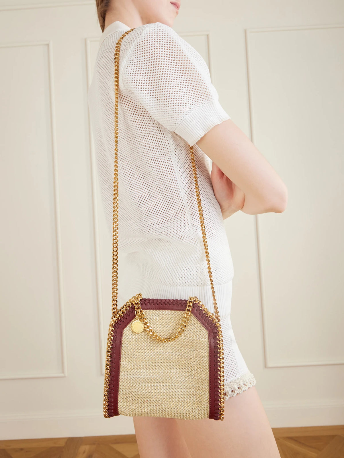 Image of Bags. Product name - The Falabella Tiny Vegetarian Leather-trimmed Raffia Shoulder Bag in Beige colour by brand - Stella McCartney