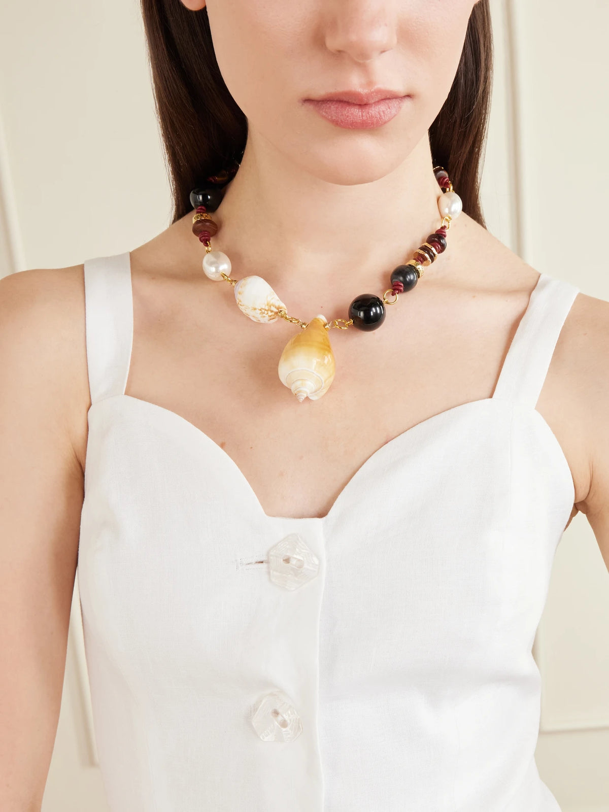 Image of Necklaces. Product name - Samsara Gold-plated, Onyx, Leather And Seashell Beaded Necklace in Ivory colour by brand - Tohum