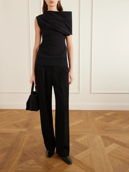 Image of a model wearing Tops. Product name - One-shoulder Cotton Top in Black colour by brand - TOTEME