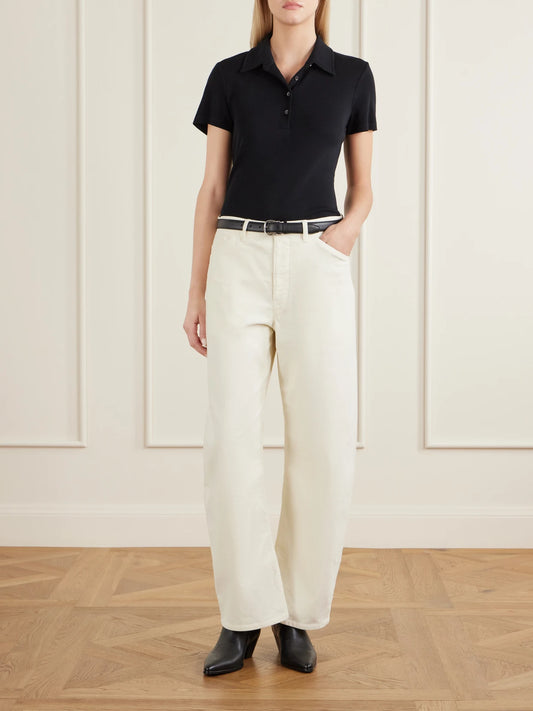 Image of a model wearing Pants. Product name - Tribeca Cotton-blend Tapered Pants in White colour by brand - Nili Lotan