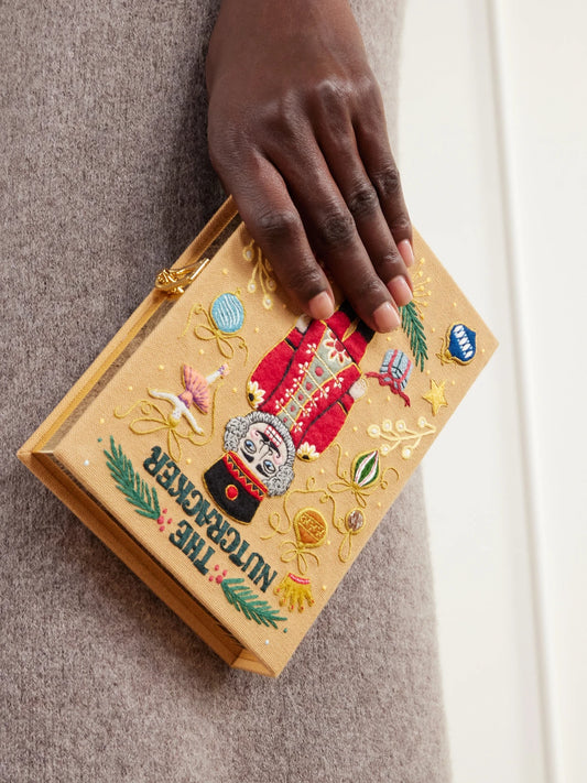 Image of Bags. Product name - The Nutcracker Embroidered Canvas Clutch in Beige colour by brand - Olympia Le-Tan