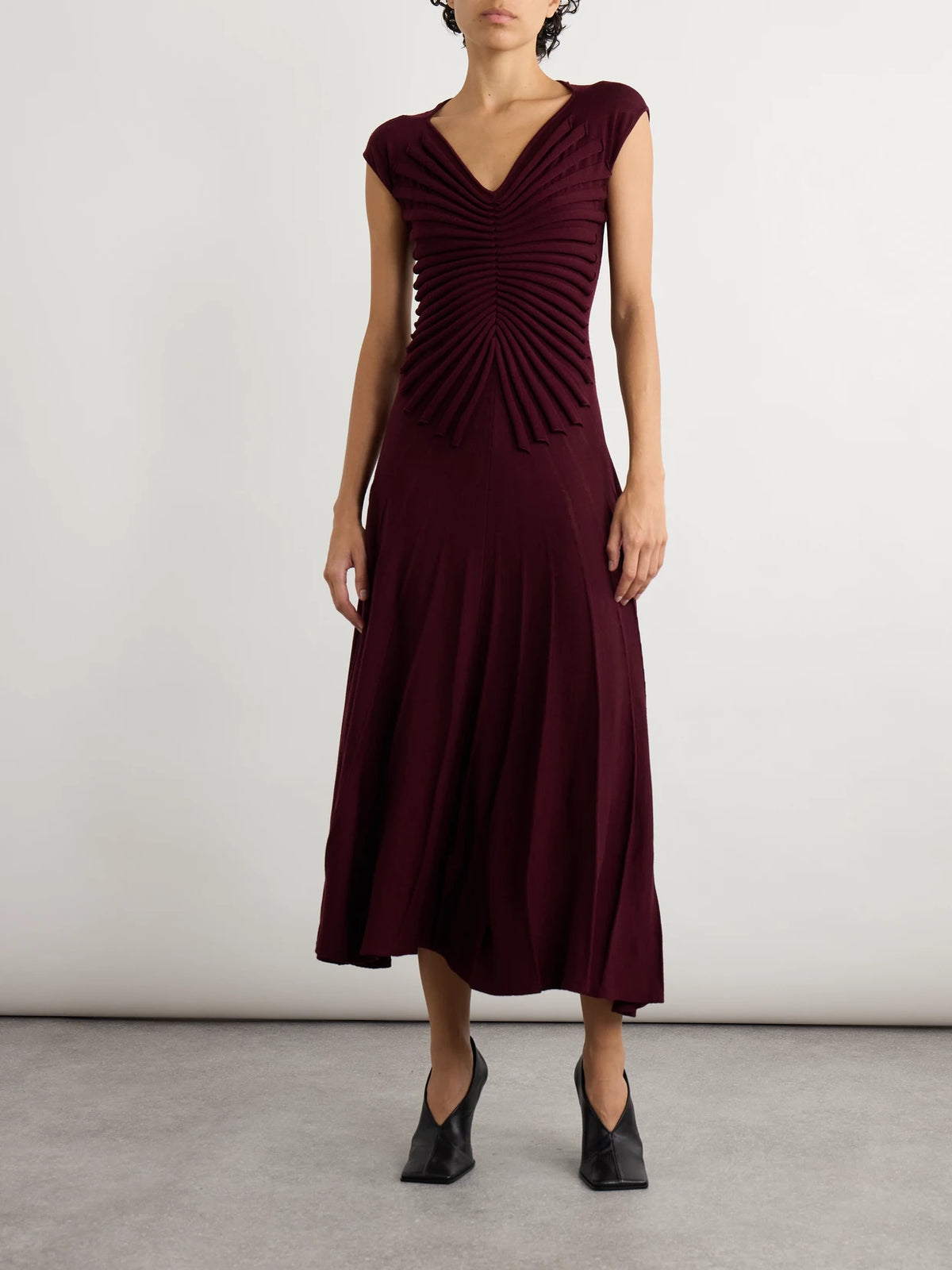 Image of Dresses. Product name - Pleated Wool Midi Dress in Burgundy colour by brand - Alaïa