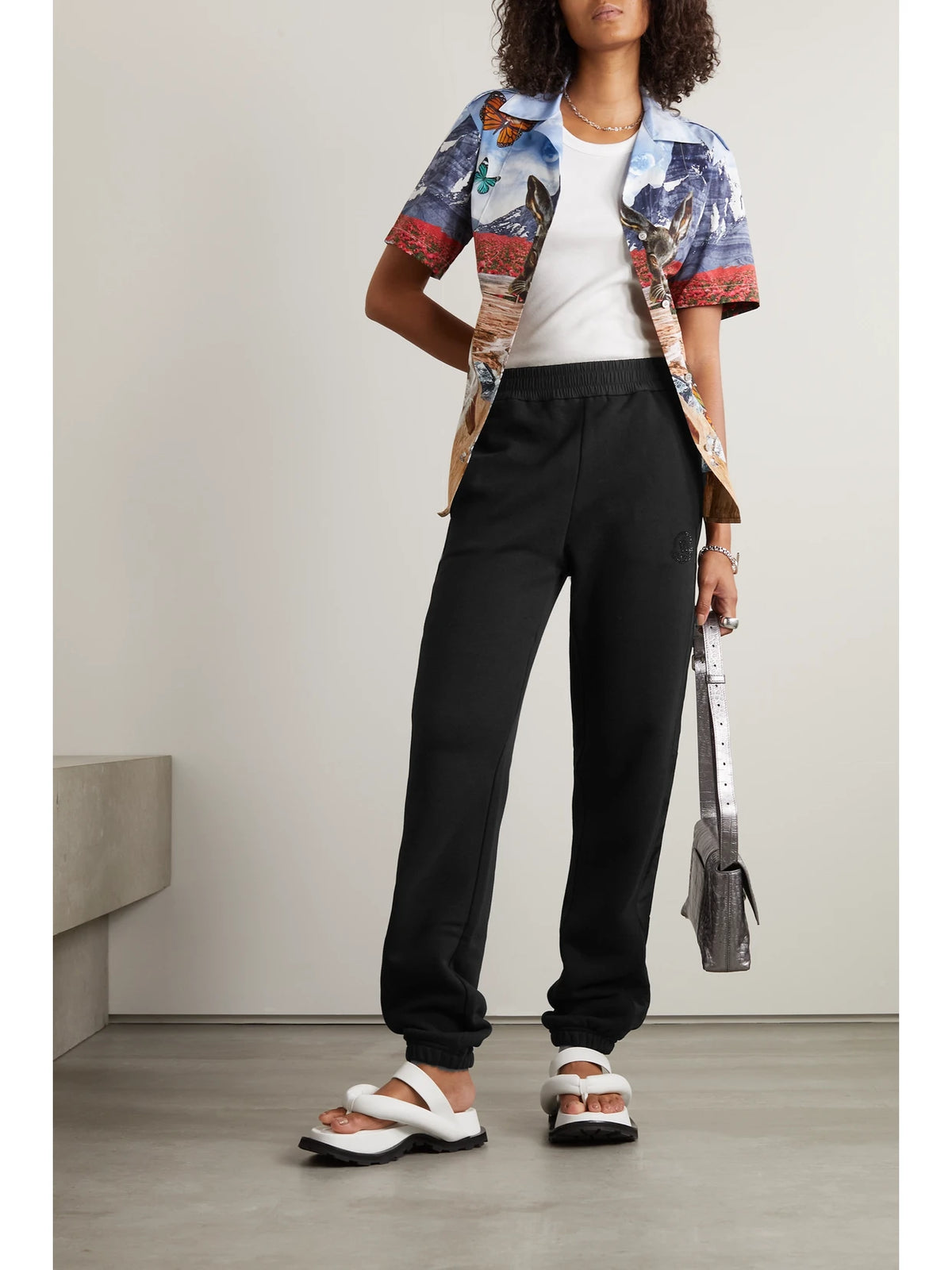 Image of Sleepwear & Loungewear. Product name - Embellished Shell-trimmed Cotton-jersey Track Pants in Black colour by brand - Moncler