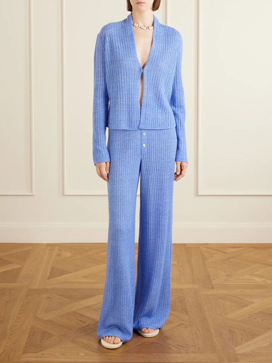 Image of a model wearing Outerwear. Product name - Everywear Ribbed Cashmere And Linen-blend Wide-leg Pants in Blue colour by brand - Guest In Residence