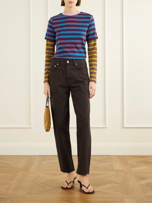 Image of a model wearing Tops. Product name - Dillon Layered Striped Stretch Cotton-jersey T-shirt in Blue colour by brand - STAUD
