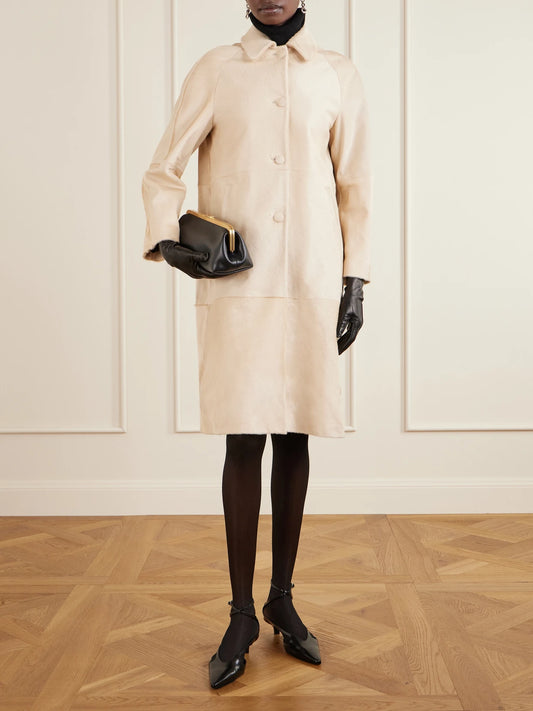 Image of Coats & Jackets. Product name - Paneled Calf Hair Coat in Cream colour by brand - Nour Hammour