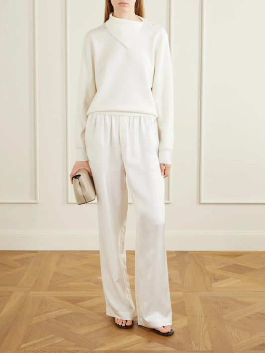 Image of a model wearing Pants. Product name - Silk-satin Wide-leg Pants in White, Blue, Taupe colour by brand - RÓHE