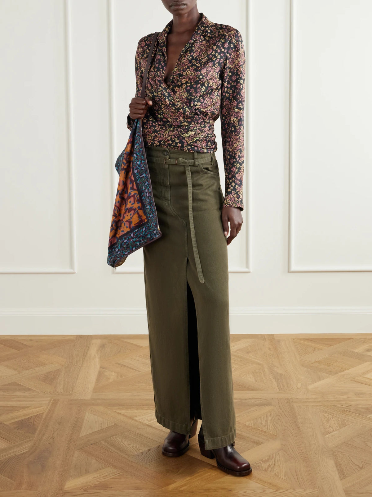 Image of a model wearing Skirts. Product name - Belted Cotton-twill Midi Skirt in Army green colour by brand - Dries Van Noten