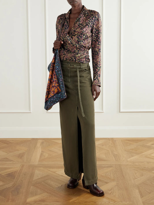 Image of a model wearing Skirts. Product name - Belted Cotton-twill Midi Skirt in Army green colour by brand - Dries Van Noten