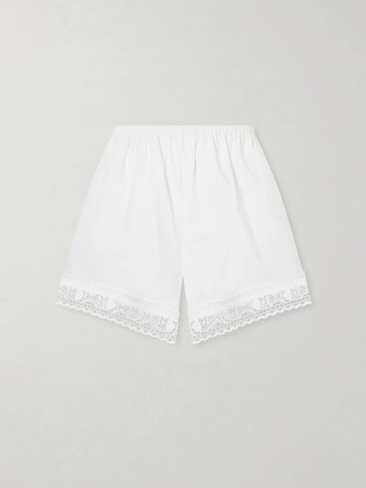 Image of a model wearing Shorts. Product name - +da Adolfo Brezza Cotton-blend Shorts in White colour by brand - STAUD