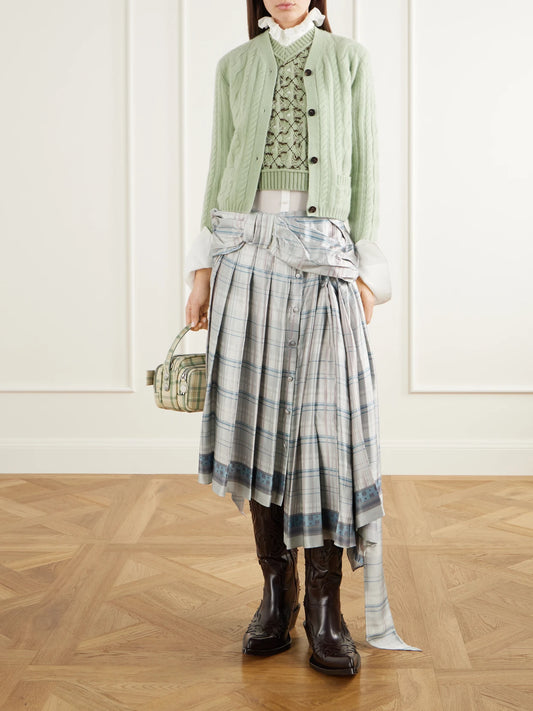 Image of a model wearing Outerwear. Product name - Laddered-argyle Open-knit Wool-blend Vest in Light green colour by brand - Acne Studios