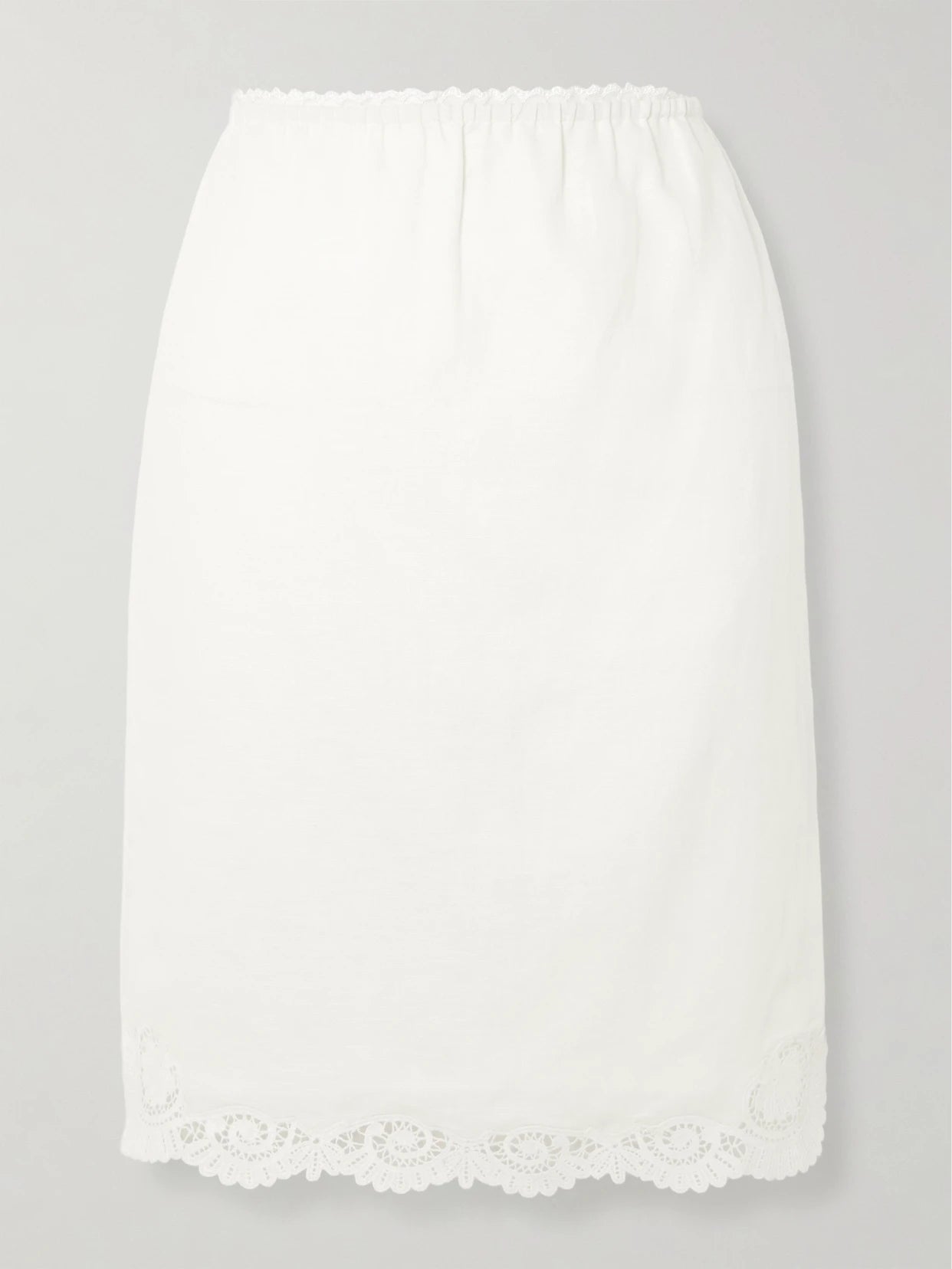 Image of a model wearing Skirts. Product name - Darya Lace-trimmed Linen And Cotton-blend Midi Skirt in Cream colour by brand - Posse
