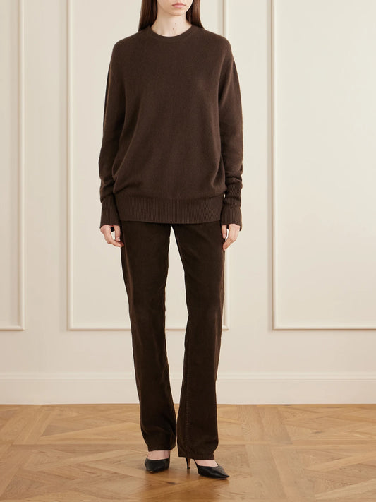 Image of a model wearing Pants. Product name - Frava Cotton-corduroy Mid-rise Straight-leg Pants in Dark brown colour by brand - The Row