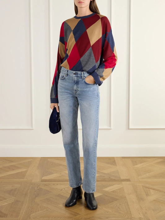 Image of a model wearing Outerwear. Product name - James Argyle Merino Wool Sweater in Multi colour by brand - LESET