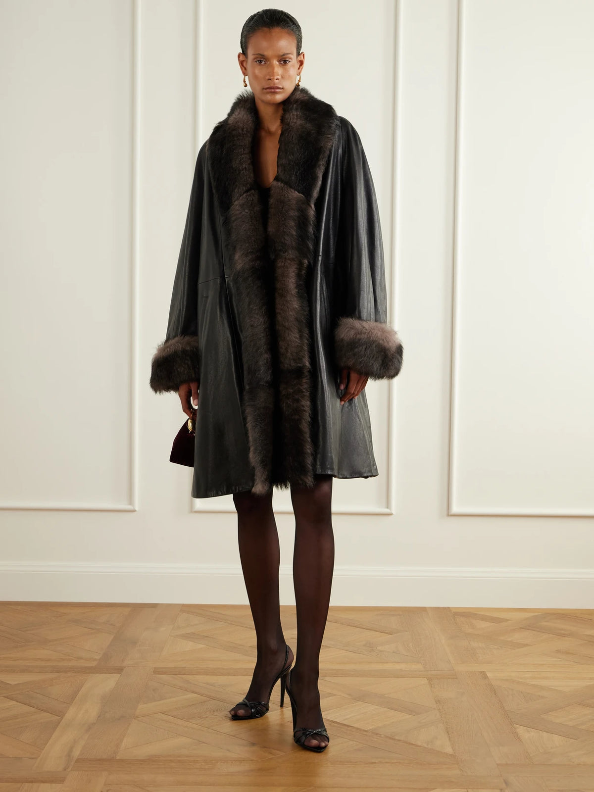 Image of Coats & Jackets. Product name - Aida Shearling-trimmed Leather Coat in Black colour by brand - Nour Hammour