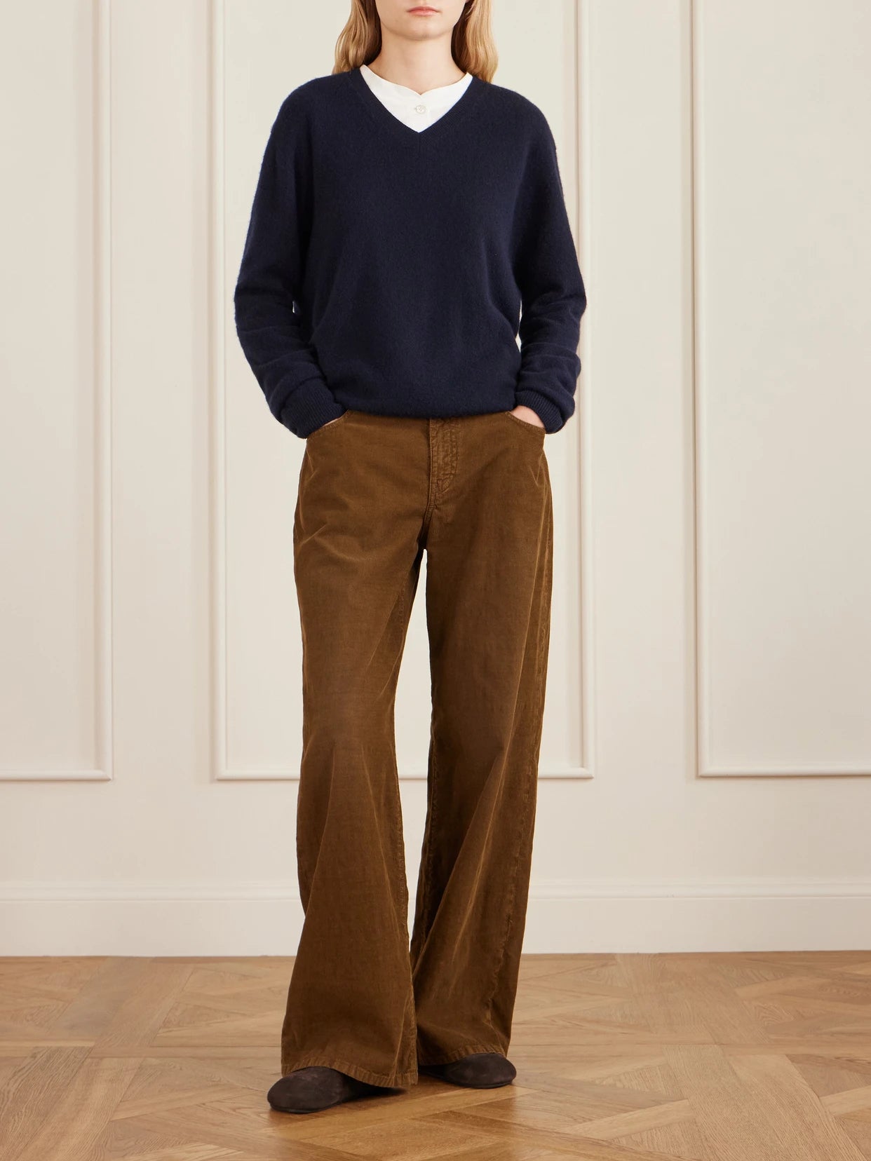 Image of a model wearing Pants. Product name - Eglitta Cotton-blend Corduroy Pants in Camel colour by brand - The Row