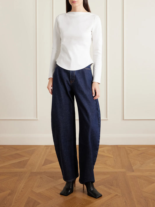 Image of a model wearing Tops. Product name - Asymmetric Cotton-blend Jersey Top in White colour by brand - Alaïa