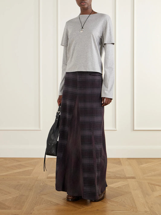 Image of a model wearing Skirts. Product name - Rebel Checked Cotton-flannel Maxi Skirt in Purple colour by brand - Our Legacy