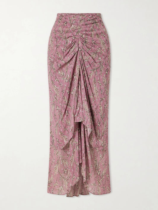 Image of a model wearing Skirts. Product name - Sira Ruffled Floral-print Metallic Maxi Skirt in Pink colour by brand - Veronica Beard