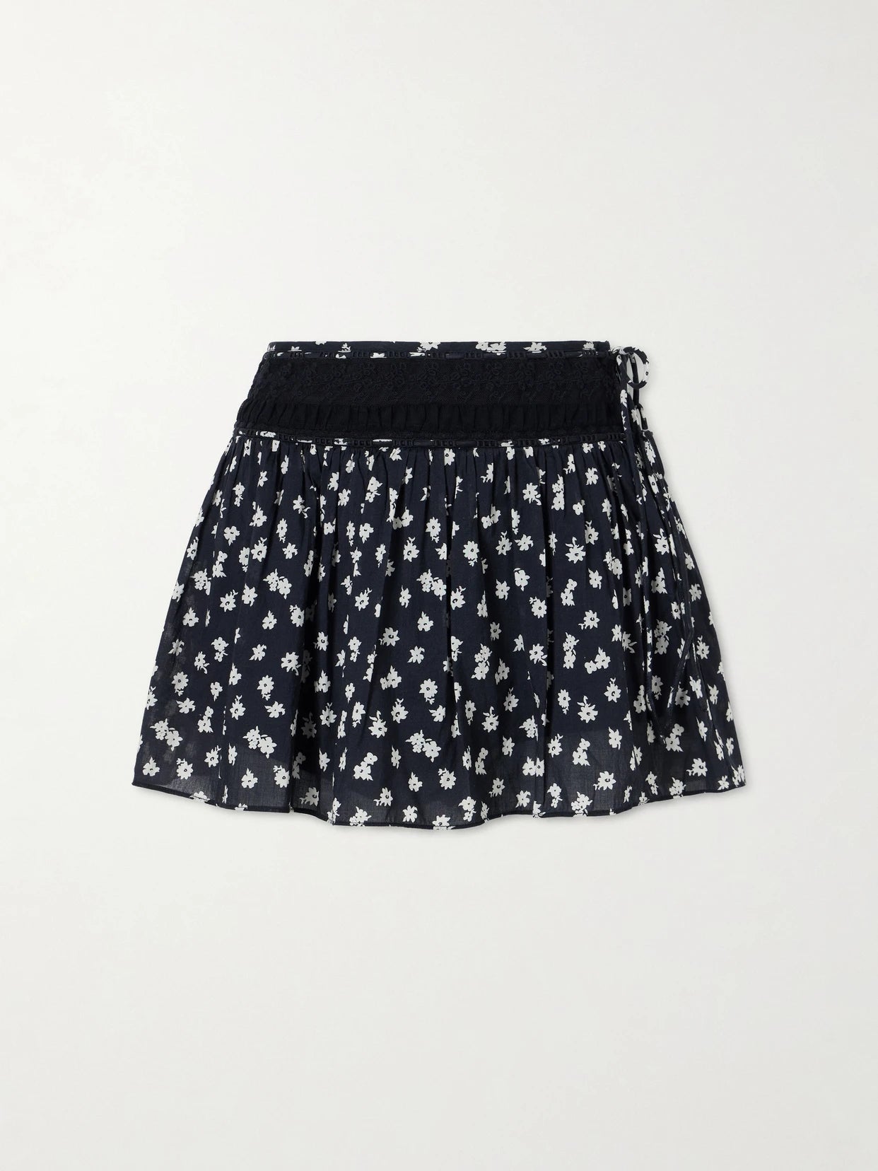 Image of a model wearing Skirts. Product name - Danielle Floral-print Lace-trimmed Cotton-voile Mini Skirt in Black colour by brand - Posse