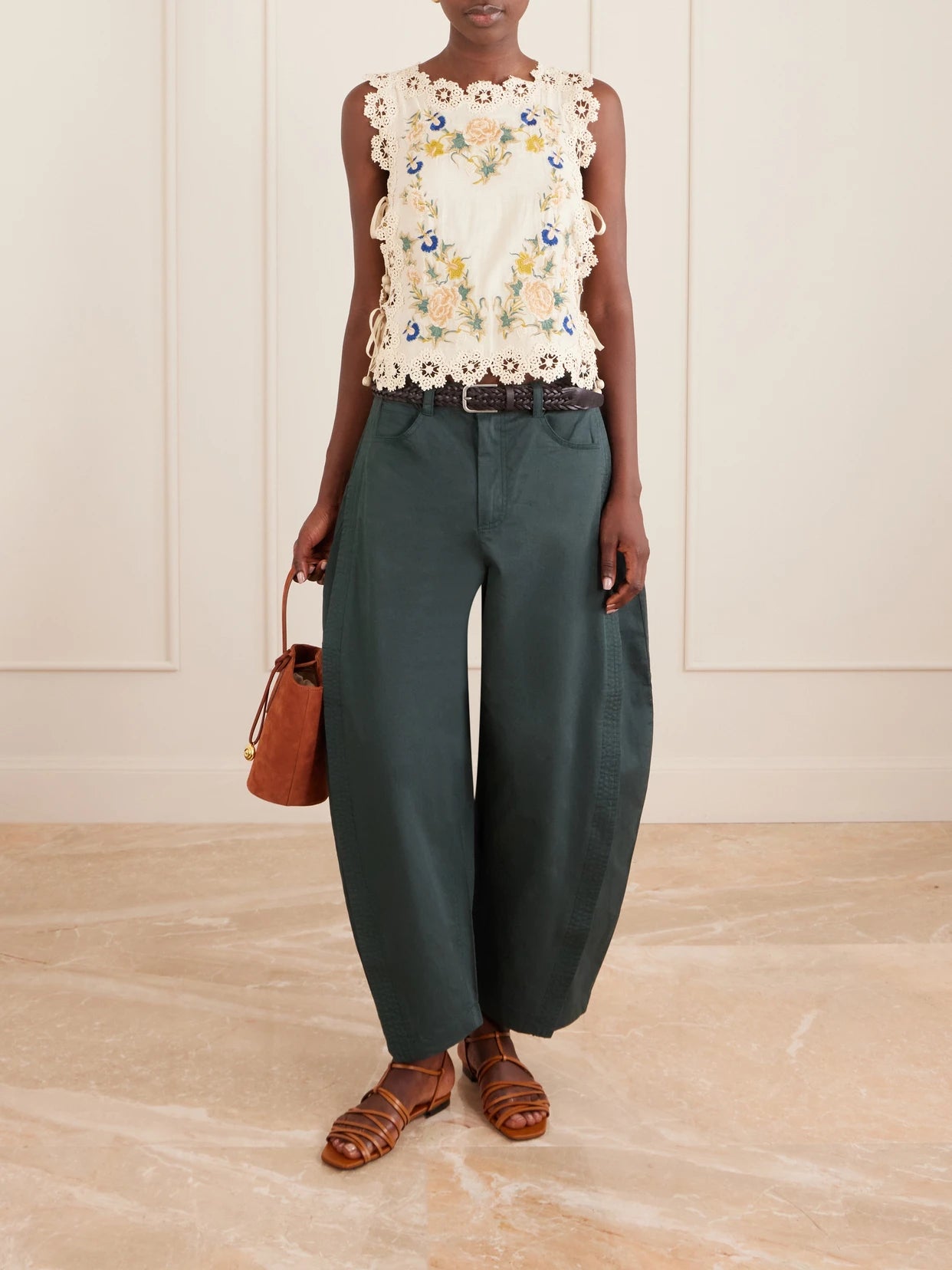Image of a model wearing Tops. Product name - Adonna Floral-embroidered Crochet-trimmed Cotton Tank in Cream colour by brand - Sea