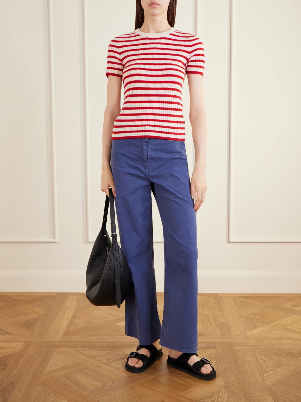 Image of a model wearing Pants. Product name - Megan Cotton-blend Wide-leg Pants in Blue colour by brand - Nili Lotan