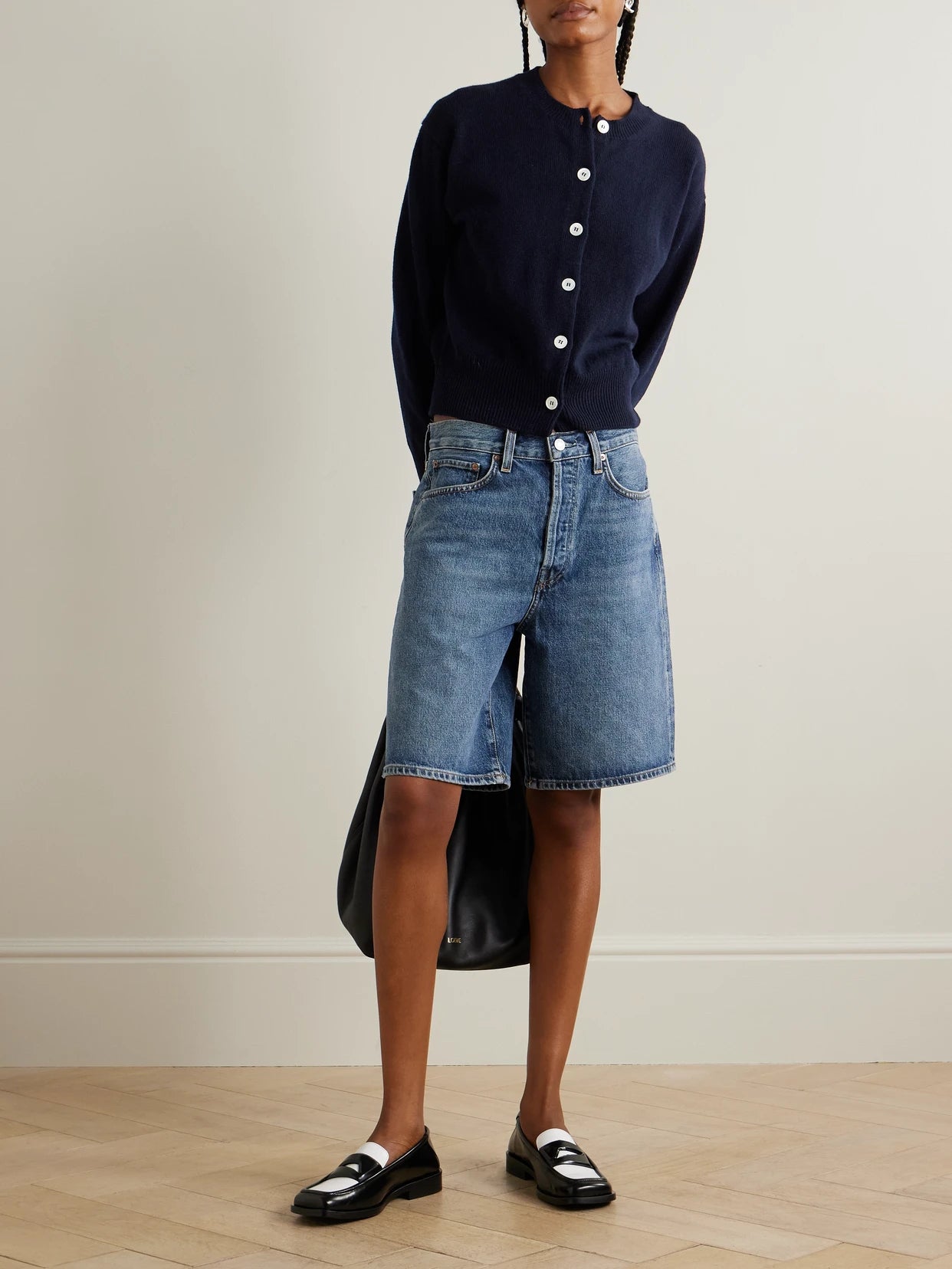 Image of a model wearing Outerwear. Product name - Ada Wool Cardigan in Navy colour by brand - &Daughter