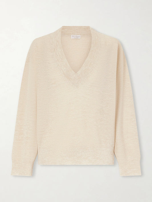 Image of a model wearing Outerwear. Product name - Knitted Sweater in Cream colour by brand - Brunello Cucinelli