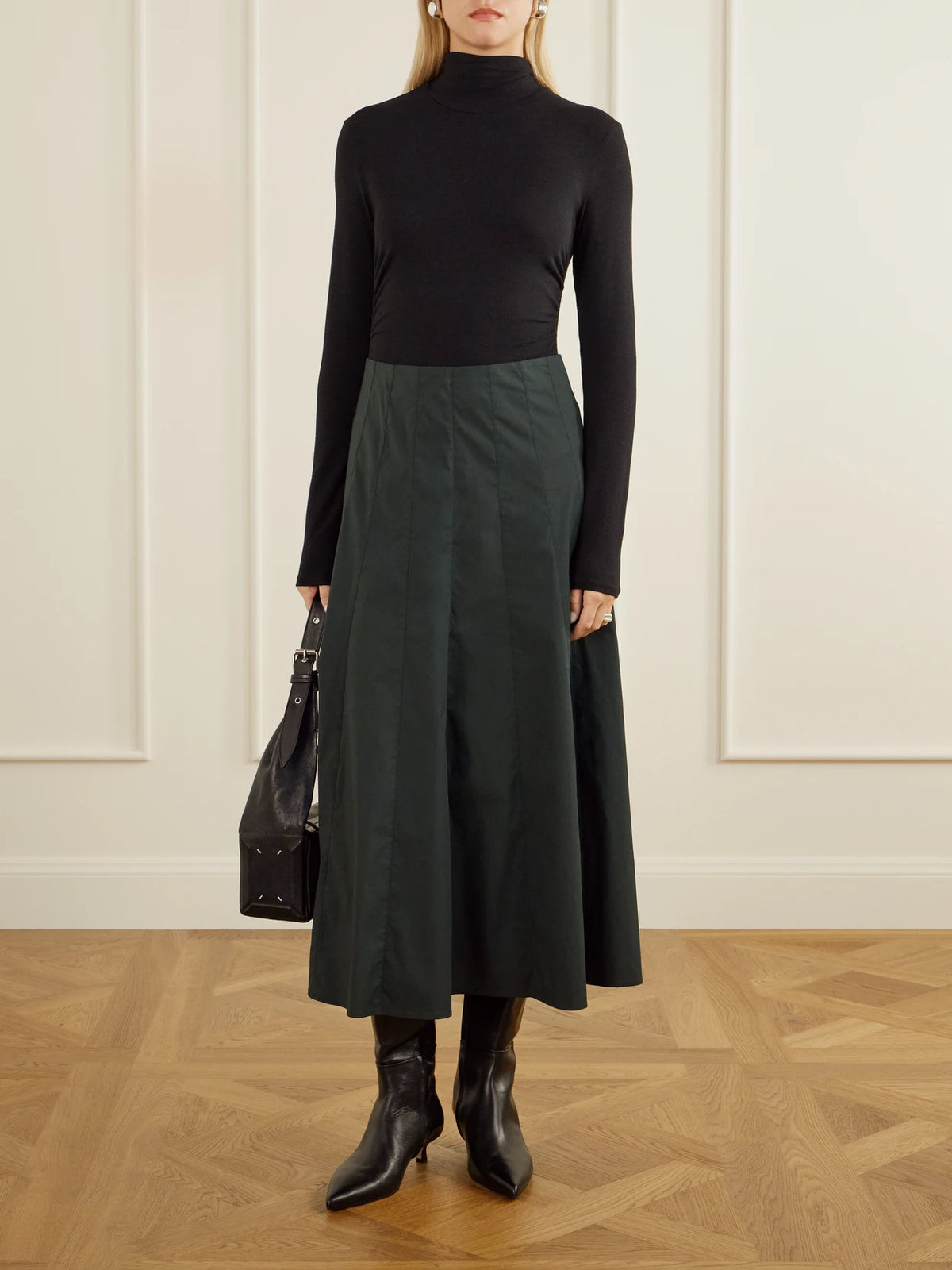 Image of a model wearing Skirts. Product name - Heidi Stretch Cotton-blend Midi Skirt in Dark green colour by brand - Proenza Schouler White Label