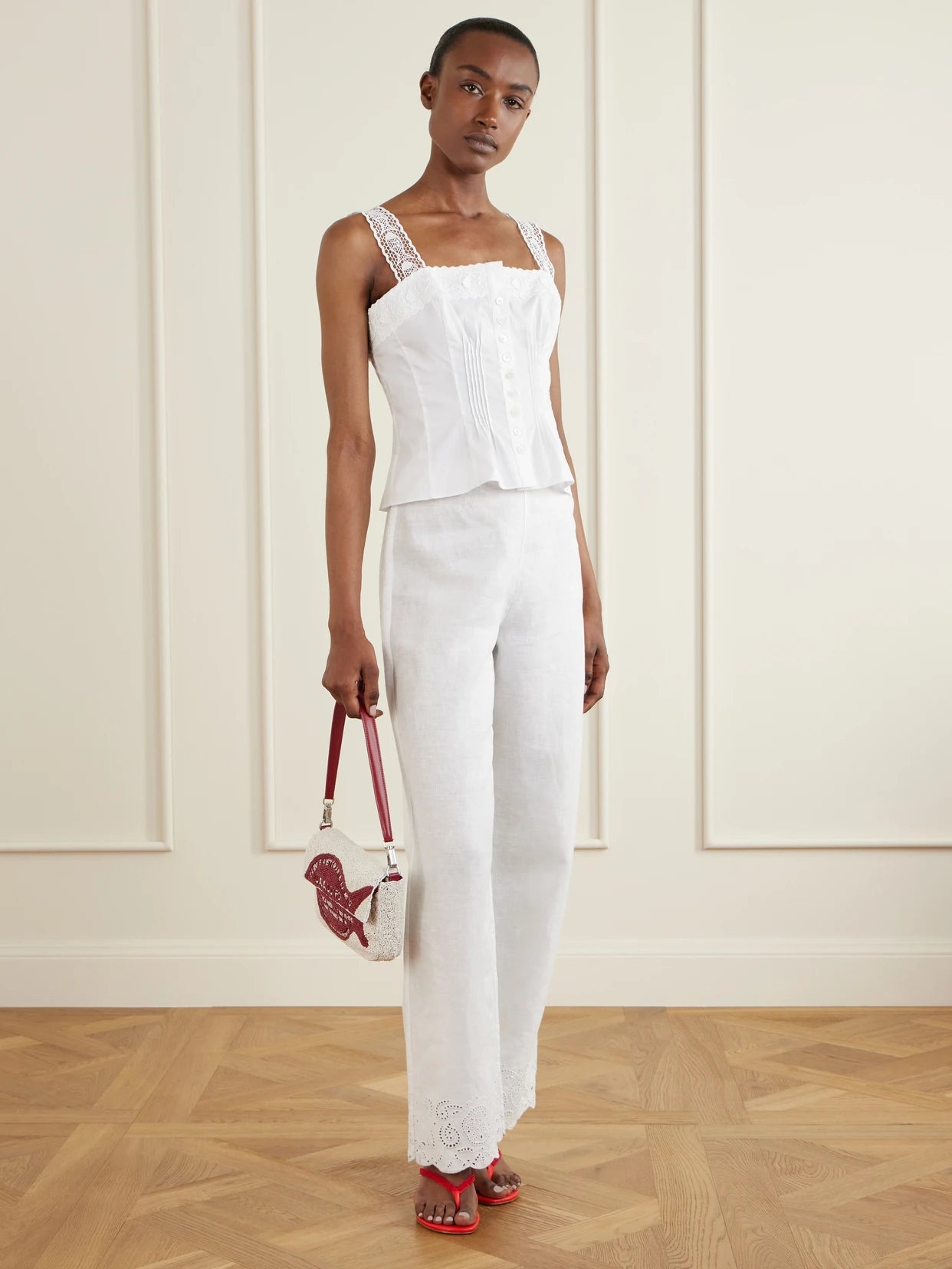 Image of a model wearing Tops. Product name - + Da Adolfo Matilde Cotton-blend Tank in White colour by brand - STAUD