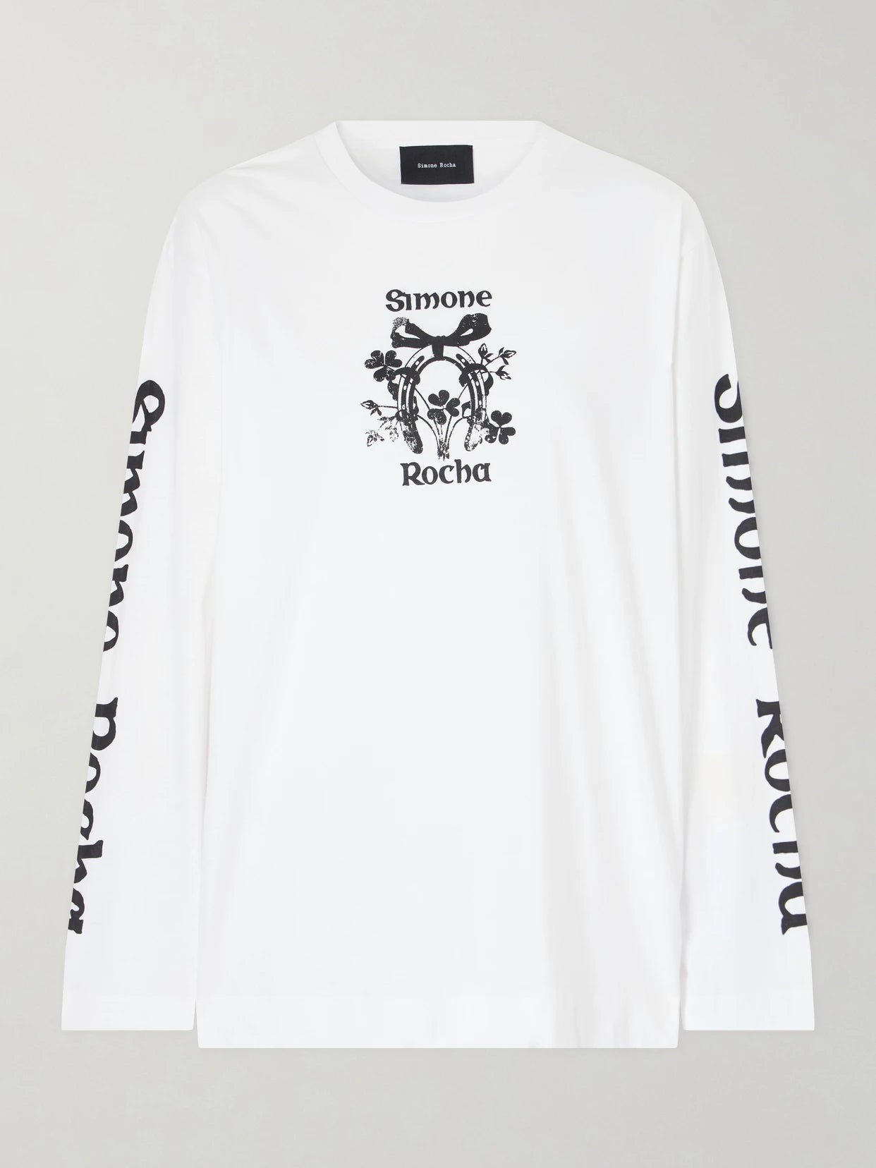 Image of a model wearing Tops. Product name - Logo-printed Cotton-jersey T-shirt in White colour by brand - Simone Rocha