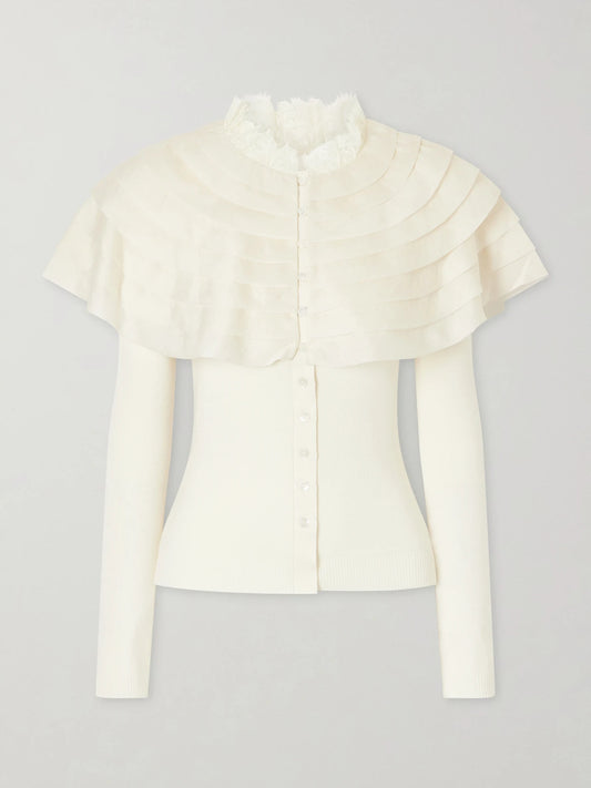 Image of a model wearing Outerwear. Product name - Wanda Ruffled Lace And Brocade-trimmed Wool Cardigan in Cream colour by brand - Sea