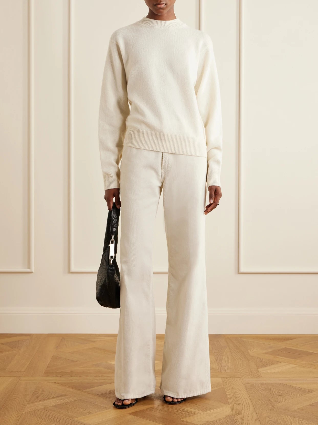 Image of a model wearing Outerwear. Product name - Rose Wool And Cashmere-blend Sweater in Off-white colour by brand - Haikure