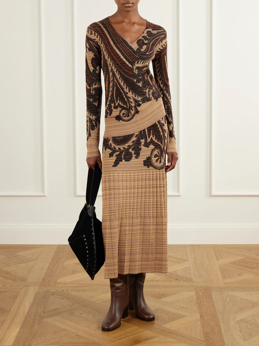 Image of a model wearing Skirts. Product name - Paisley Printed Plissé-knit Midi Skirt in Beige colour by brand - Etro