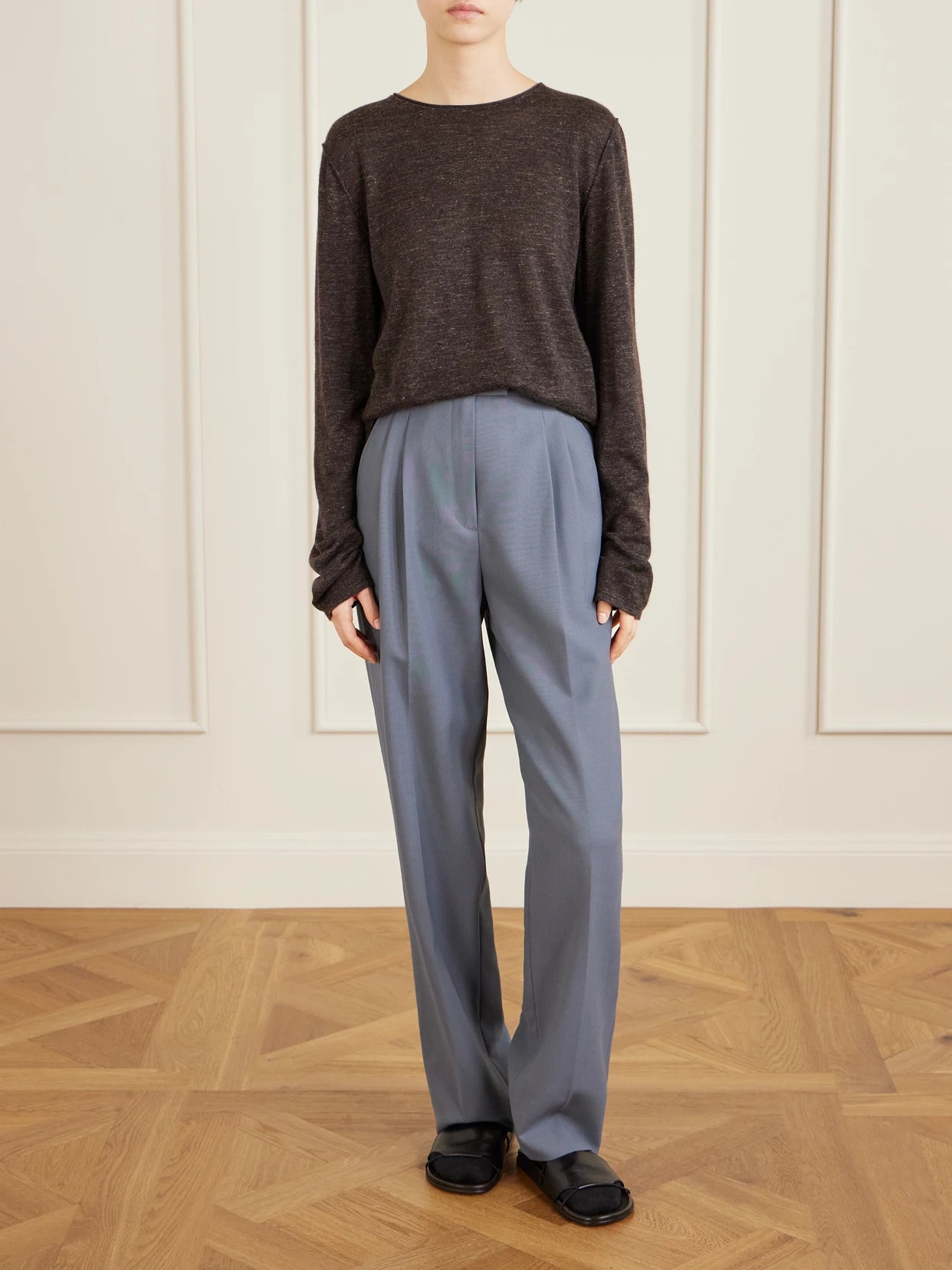 Image of a model wearing Outerwear. Product name - Nile Cashmere, Silk And Linen Blend Sweater in Dark brown colour by brand - The Row