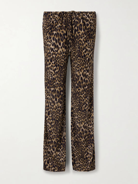 Image of a model wearing Pants. Product name - Adriel Leopard-print Crepe De Chine Wide-leg Pants in Leopard print colour by brand - Nili Lotan