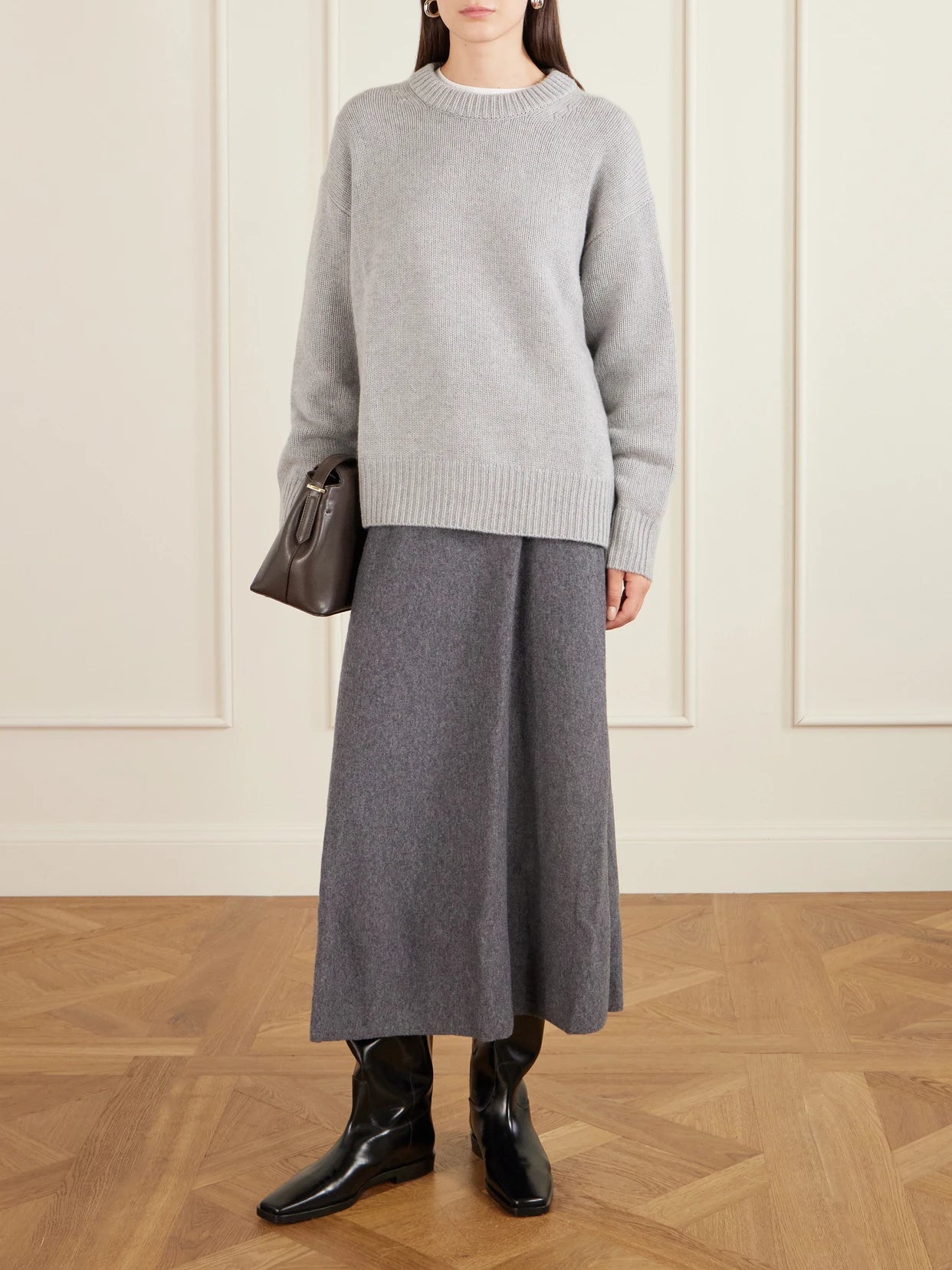 Image of a model wearing Outerwear. Product name - Renske Cashmere Sweater in Gray colour by brand - LISA YANG