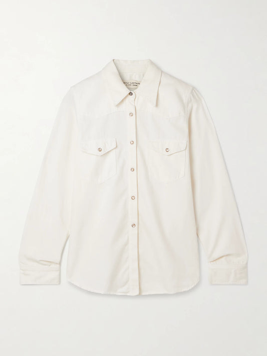 Image of a model wearing Tops. Product name - Travis Denim Shirt in Cream colour by brand - Nili Lotan