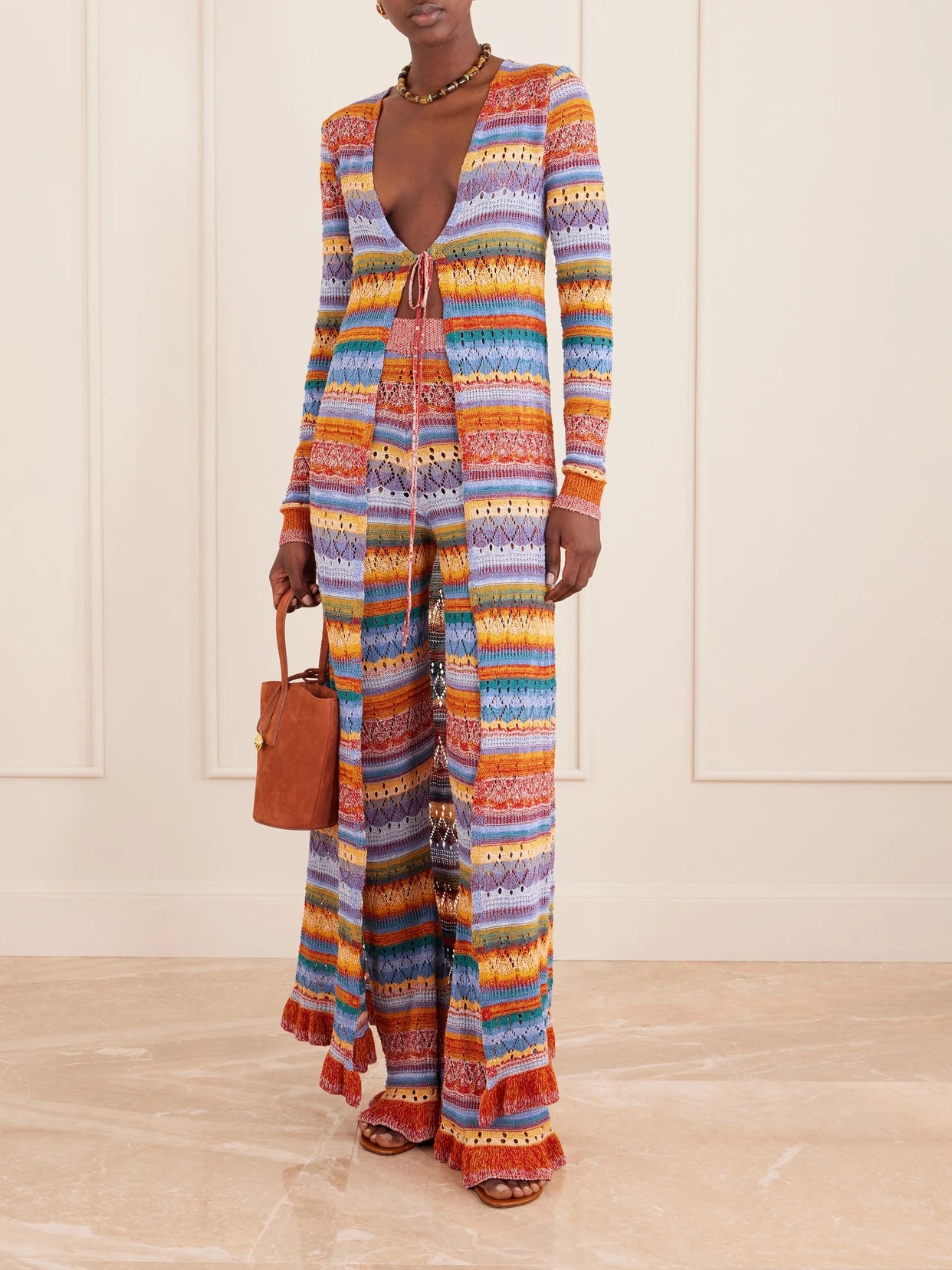 Image of a model wearing Outerwear. Product name - Striped Pointelle-knit Cotton Cardigan in Red colour by brand - Etro