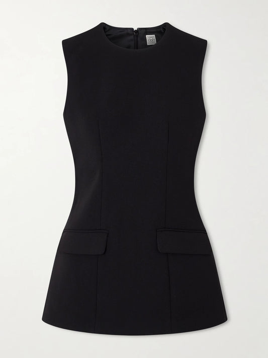 Image of a model wearing Tops. Product name - Darted Cady Top in Black colour by brand - TOTEME