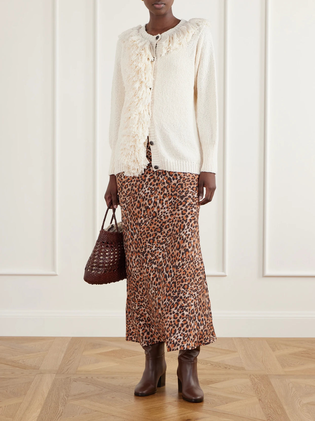 Image of a model wearing Skirts. Product name - Lyra Leopard-print Silk-crepe De Chine Maxi Skirt in Leopard print colour by brand - ALIX OF BOHEMIA
