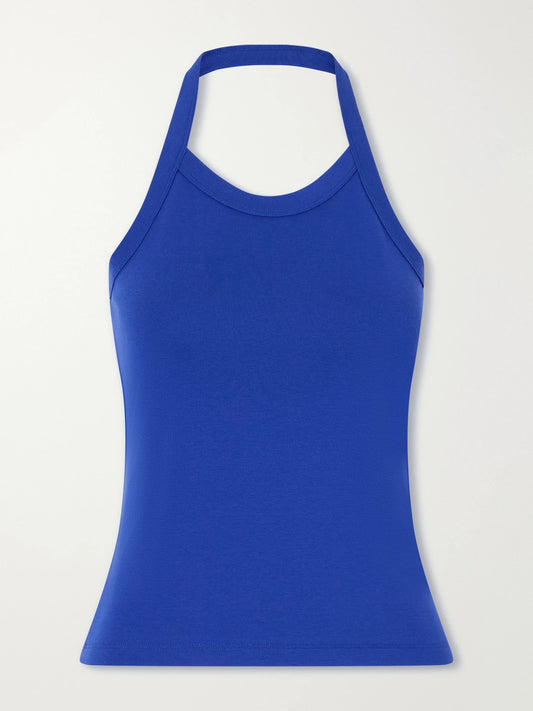 Image of a model wearing Tops. Product name - Angie Halterneck Organic Cotton-jersey Tank in Blue colour by brand - FLORE FLORE