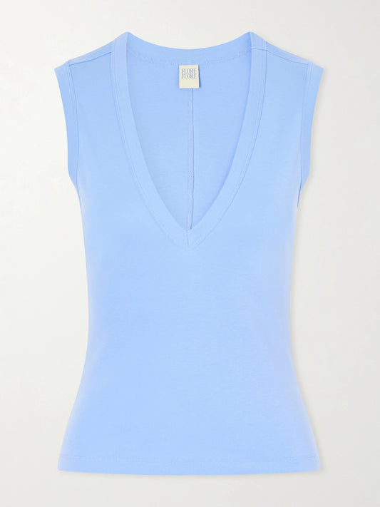 Image of a model wearing Tops. Product name - Dewi Organic Cotton Jersey Tank in Blue colour by brand - FLORE FLORE
